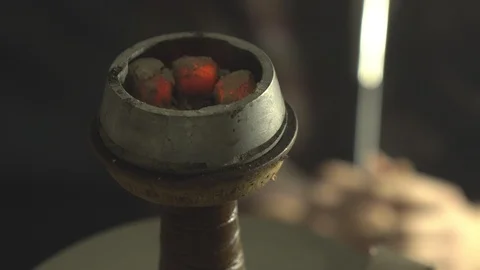 Coals for a hookah pipe heating Stock Footage 102528761