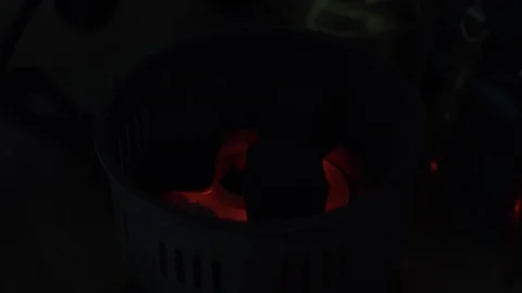 Coals for a hookah pipe heating in Time-lapse Stock Footage 102532766