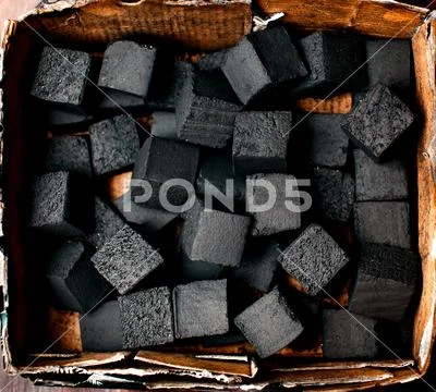 Coals for igniting hookah. Stock Photos