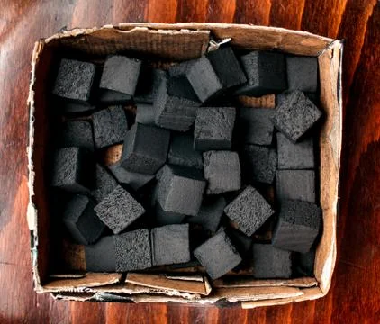 Coals for igniting hookah. Stock Photos