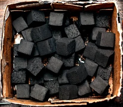 Coals for igniting hookah. Stock Photos