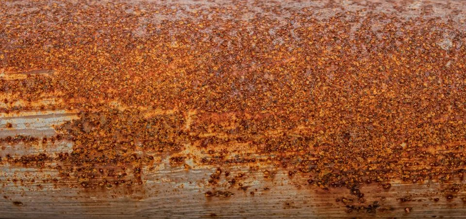 Coarse orange rust background texture Stock Photos