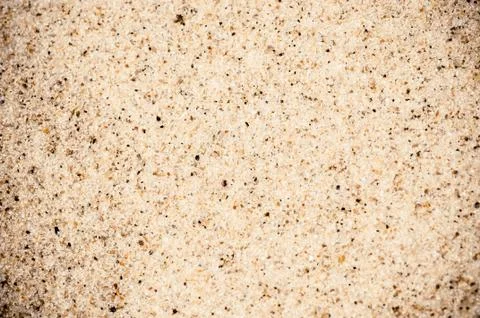 Coarse sand background texture. macro of coarse sand grains Stock Photos