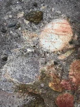Coarse Sedimentary Conglomerate Rock Surface with Embedded Rounded Pebbles Stock Photos