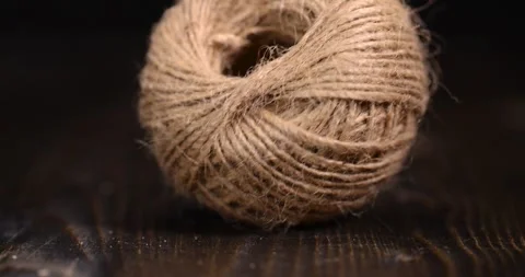 Coarse skein of thread on a blackboard, coarse linen threads for construction Stock Footage 279521412