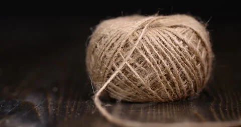 Coarse skein of thread on a blackboard, coarse linen threads for construction Stock Footage 279878508