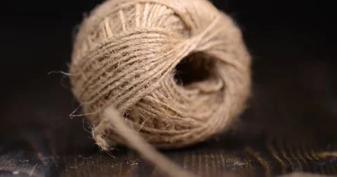 Coarse skein of thread on a blackboard, coarse linen threads for construction Stock Footage 280226644