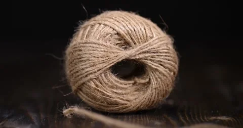 Coarse skein of thread on a blackboard, coarse linen threads for construction Stock Footage 280335635