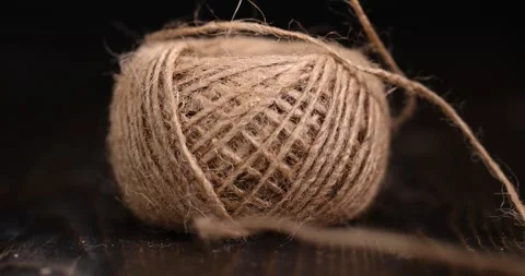 Coarse skein of thread on a blackboard, coarse linen threads for construction Stock Footage 280370022