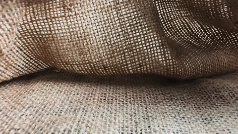 Coarse texture of woven brown burlap fabric Stock Footage 340581171