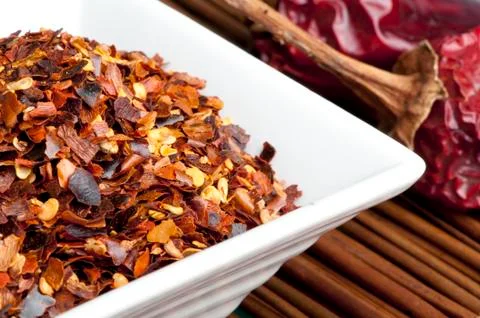 Coarsely ground red pepper Stock Photos