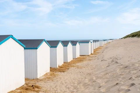 On the coast with beach huts Stock Photos