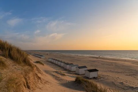 On the coast with beach huts Stock Photos
