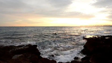 The coast of Benicasim at sunrise, Castellon Video stock 83560853