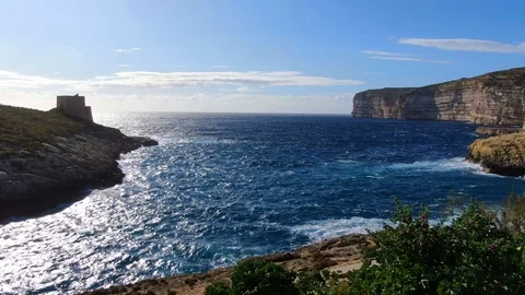 Coast of Gozo at sunset by drone Video stock 126067866