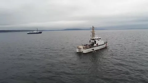 Coast Guard Cutter Adelie escorting Uruguay Naval Ship ROU Oyarvide Stock Footage 288190253