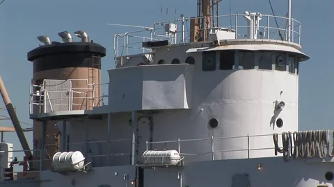 Coast Guard Cutter deck with life rafts docked in Baltimore, Maryland USA Stock Footage 105487679