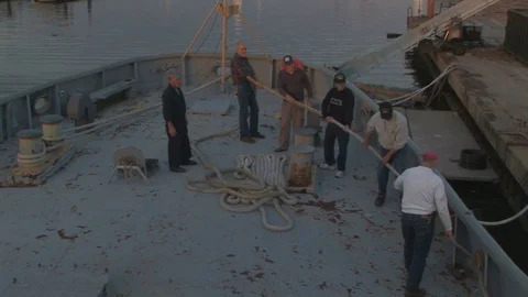 Coast Guard Cutter with Deckhands docked in Baltimore, Maryland USA Stock Footage 105691411