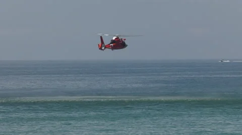 Coast Guard Dolphin Helicopter working a search area Stock Footage 65162760