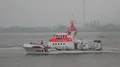 Coast guard lifeboat rescue demonstration at rainy cloudy day Bremerhaven harbor 4k or 4k+ Resolution