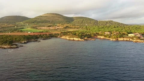 The coast of the gulf of alghero at sunset Stock Footage 138891346