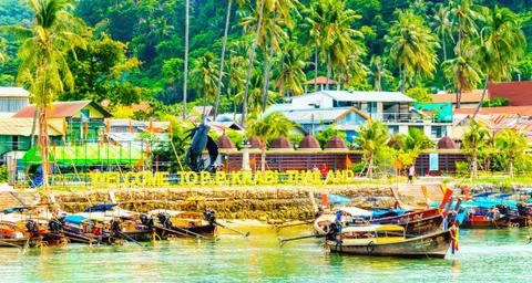 Coast of island Phi Phi Don with long tail boats Stock Photos