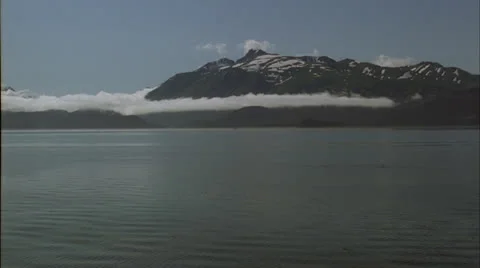 Coast line, Mountains,clouds,pan,POV,Ak Stock Footage 26661153