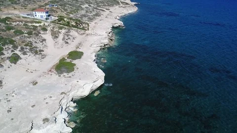 Coast with lone house Stock Footage 78356215