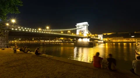 Coast of river Danube under the Chain bridge by night Stock Footage 53789916
