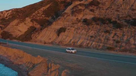 Coast Road In Sunset Fire Light Drone Aerial Nature Wild Landscape Golden Hour Stock Footage 154521564