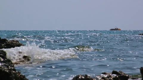 Coast Rocks and Speedboat Stock-Footage 44415048