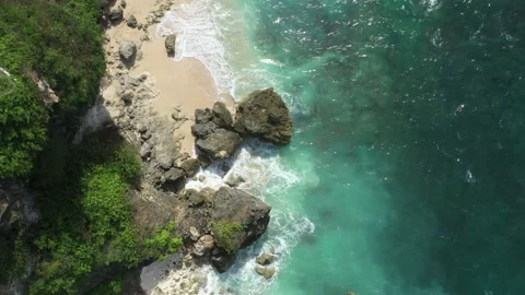 The coast of the sea with drone, rocks, sand and waves of the sea Stock Footage 230951035