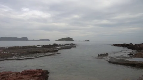 The coast in the sea of Santa Eulalia a cloudy day, Ibiza Stock Footage 102485134