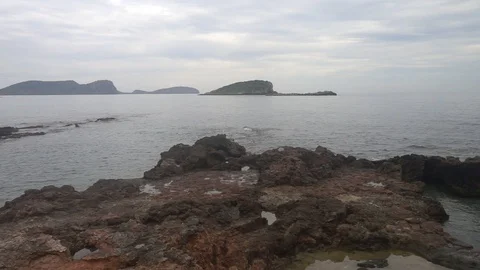 The coast in the sea of Santa Eulalia a cloudy day, Ibiza Stock Footage 102485934