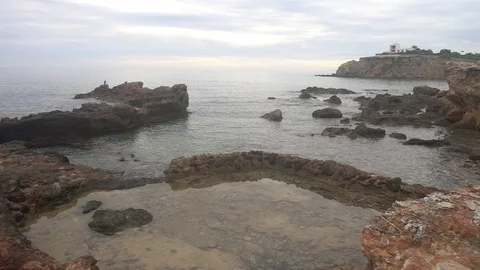 The coast in the sea of Santa Eulalia a cloudy day, Ibiza Stock Footage 102486135