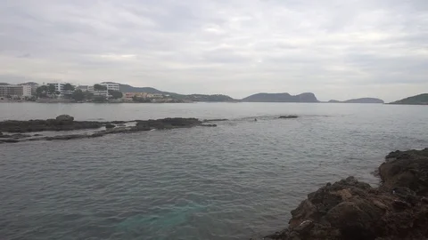 The coast in the sea of Santa Eulalia a cloudy day, Ibiza Stock Footage 102492193