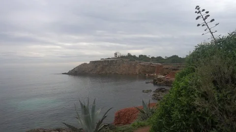 The coast in the sea of Santa Eulalia a cloudy day, Ibiza Stock Footage 102492860