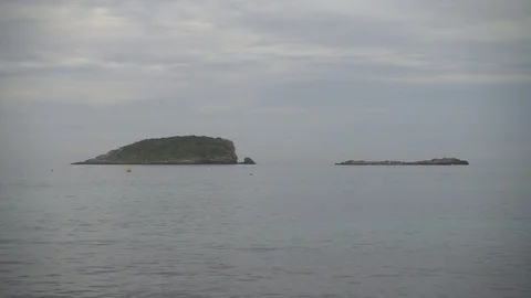 The coast in the sea of Santa Eulalia a cloudy day, Ibiza Stock Footage 102494680
