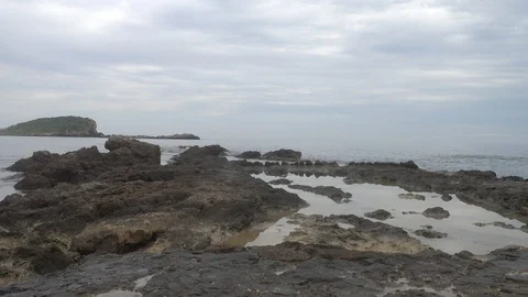 The coast in the sea of Santa Eulalia a cloudy day, Ibiza Stock Footage 102495103