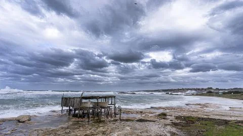 For coast with storm Stock Photos