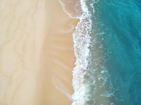 Coast with waves as a background from top view. Travel - image Фото