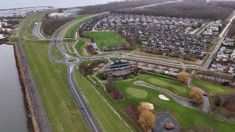 Coastal Aerial View, Elevated Perspective Of Seaside Neighborhood With Fairways Stock-Footage 325452760