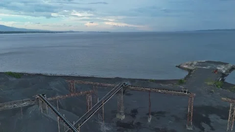 Coastal aggregate conveyor system along philippine shoreline. Stock Footage 337070762