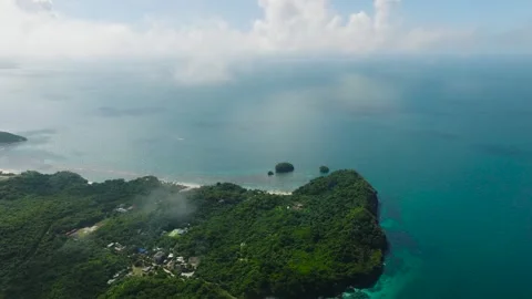 Coastal area with dense vegetation and pristine waters. Boracay Island Stock Footage 304813925