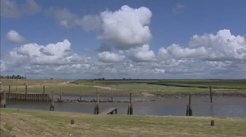 Coastal area at harbour pan reclaimed land along Wadden Sea Stock Footage