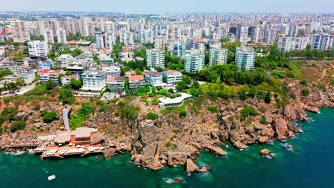 Coastal cliff with mostly low/mid-rise buildings near the edge Stock Footage 334213089