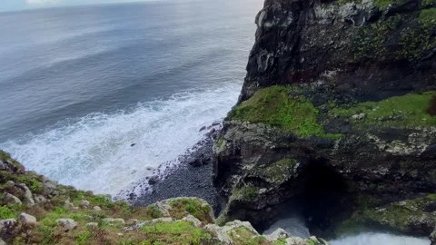 Coastal cliffs and sea caves in Madeira Portugal Stock-Footage 339775681