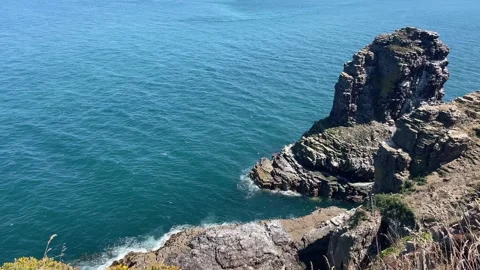 Coastal Cliffs and Sea Stack in Brittany, France Stock Footage 314988505