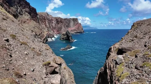 Coastal Cliffs and Turquoise Sea – Gimbal Panning Video stock 340128536