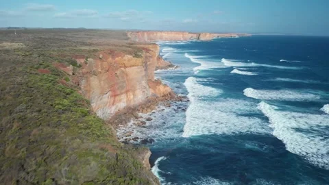 Coastal cliff’s, blue water, waves crashing 動画素材 146109094